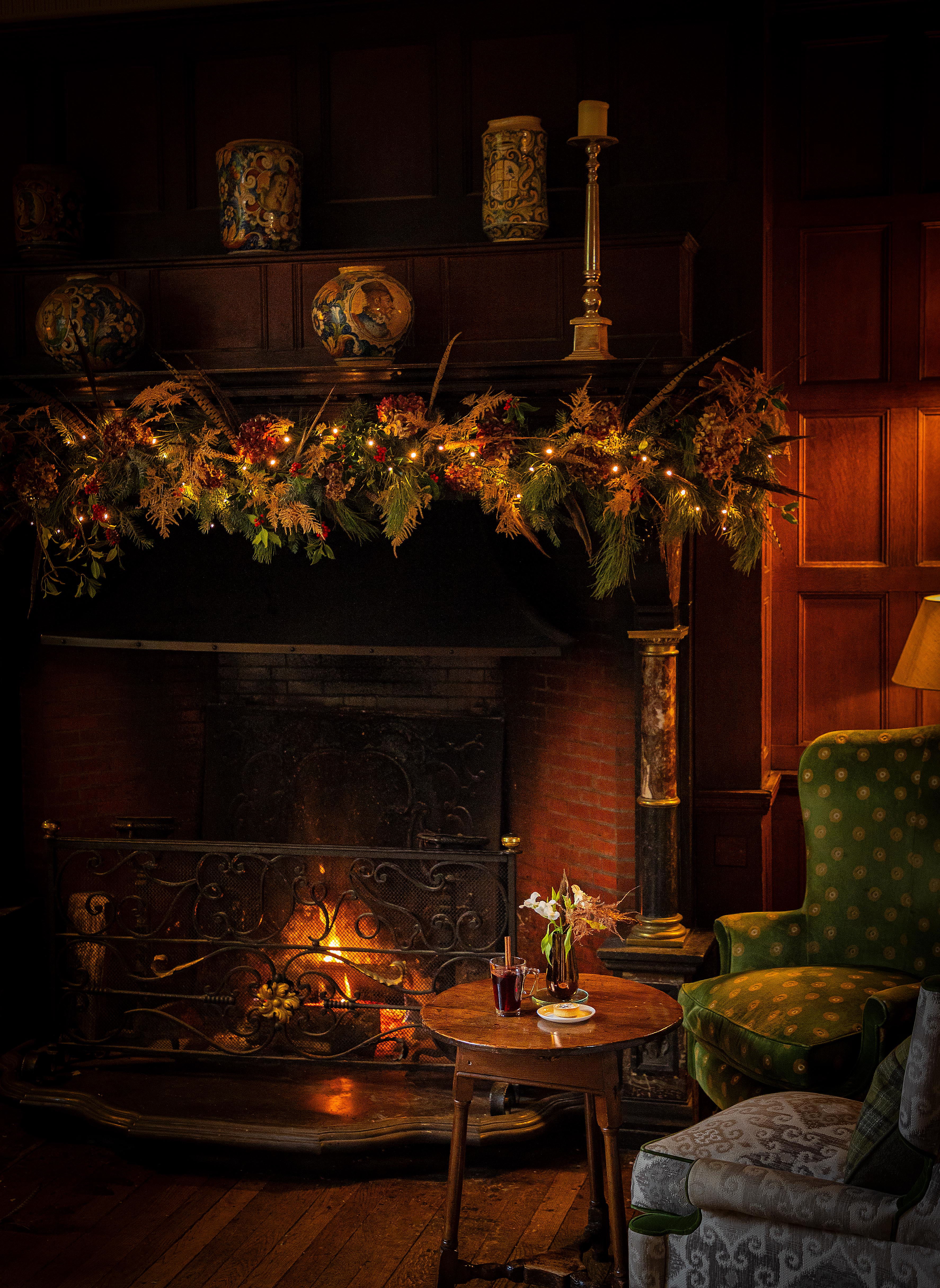 By the fire in the front hall